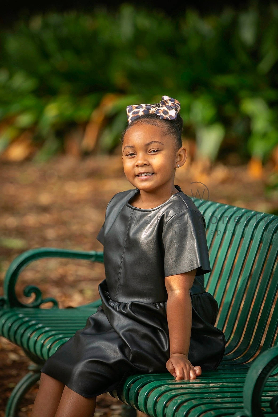 Noah is registered to the contest to win money with this photo: beauty, black, black_hair, eye, flash_photography, fun, grass, green, happy, head, human_body, joy, leisure, nature, people_in_nature, person, plant, sitting, skin, smile