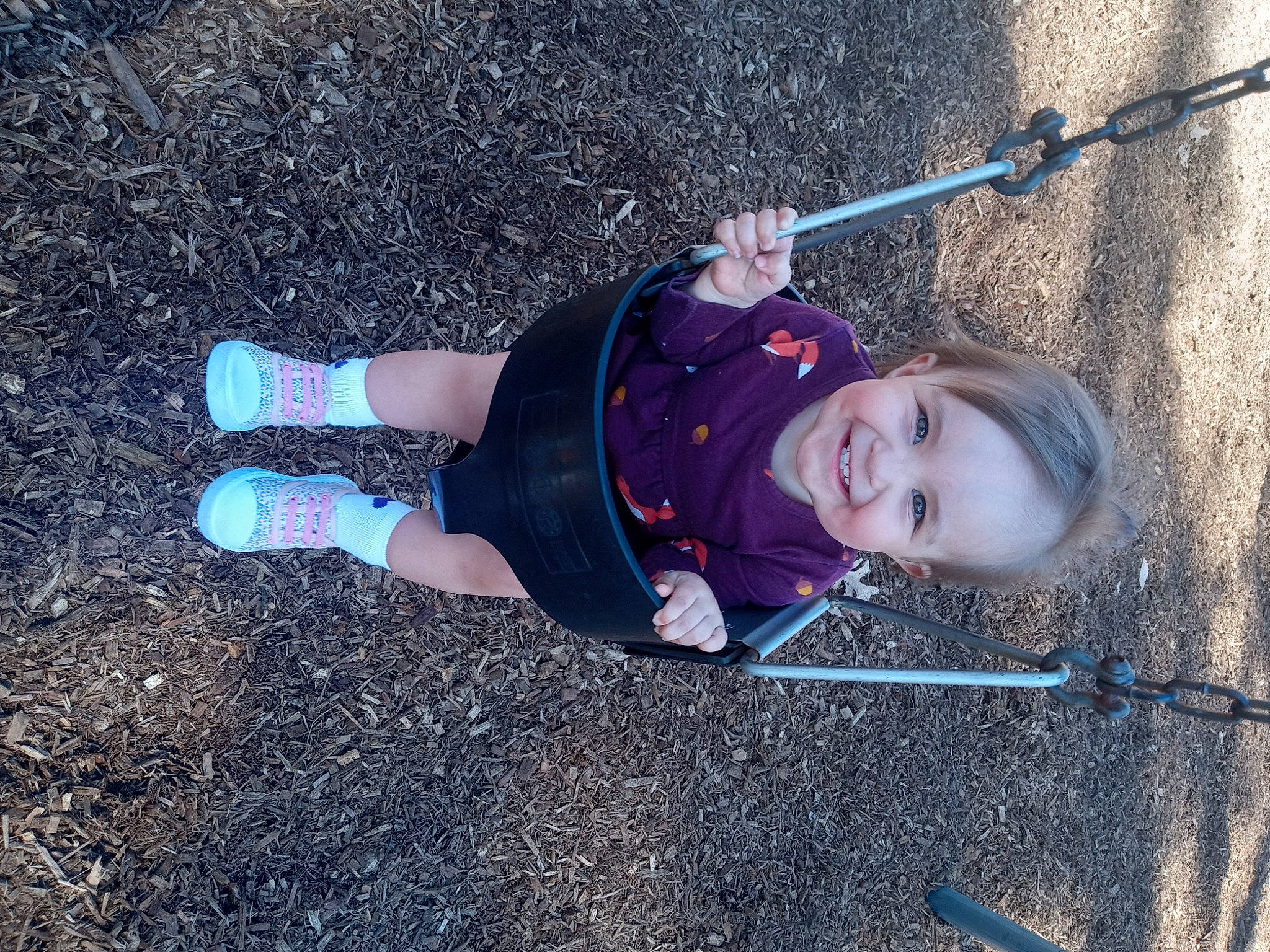 Harmony is registered to the contest to win money with this photo: adventure, asphalt, child, concrete, electric_blue, fun, grass, joy, knee, landscape, leisure, outdoor_shoe, person, recreation, road_surface, shadow, shoe, smile, sneakers, soil