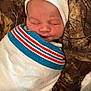 Avia is registered to the contest to win money with this photo: newborn, baby, infant, blanket, hat, sleeping, wrapped, cozy, cute, child, face, peaceful, resting, camouflage, pattern, fabric, soft, indoors, portrait, closeup