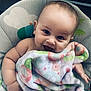 Larkyn is registered to the contest to win money with this photo: baby, blanket, smiling, face, child, infant, cute, happy, portrait, seat, pattern, colorful, soft, cozy, young, skin, hand, head, indoors, comfort