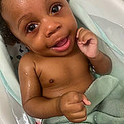 Giovanni is registered to the contest to win money with this photo: baby, child, smiling, bath, water, towel, skin, happy, cute, infant, portrait, closeup, wet, indoors, person, young, face, expression, hand, relaxation