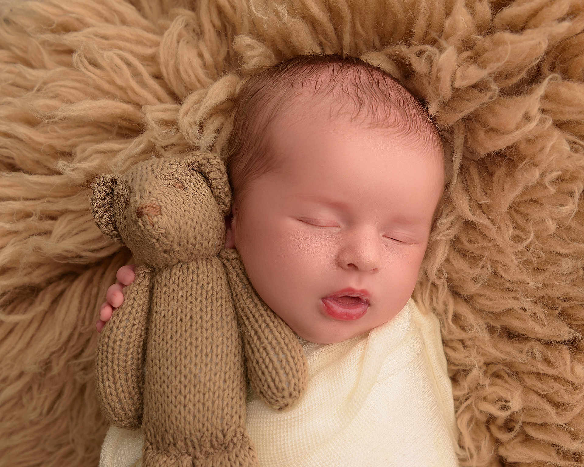 Esme joined the competition — help win amazing prizes! baby, infant, sleeping, blanket, knitted_toy, teddy_bear, soft_texture, fluffy, closeup, child, peaceful, cute, portrait, warm_colors, fabric, hand, face, rest, cozy, newborn