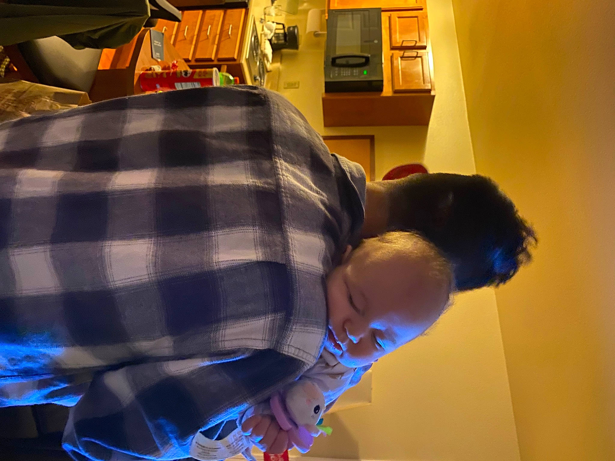 Ameya is registered to the contest to win money with this photo: backpack, bag, bookcase, child, comfort, couch, elbow, electric_blue, fun, linens, luggage_and_bags, pattern, person, plaid, room, shelf, shirt, sitting, t_shirt, tartan