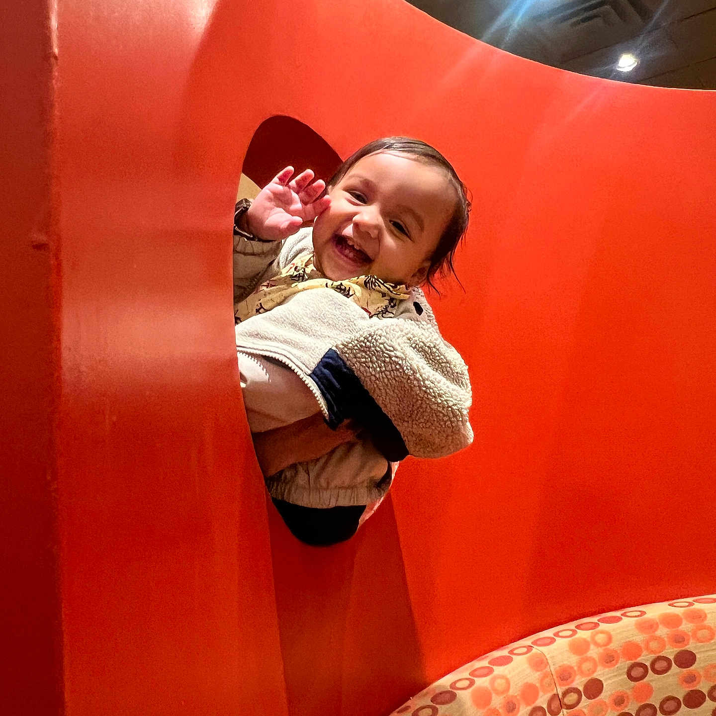 Kush joined the competition — help win amazing prizes! baby, clothing, coat, face, happy, head, indoors, jacket, knitwear, lighting, outdoorplayarea, outdoors, pants, person, photography, playarea, portrait, slide, sweater, toy