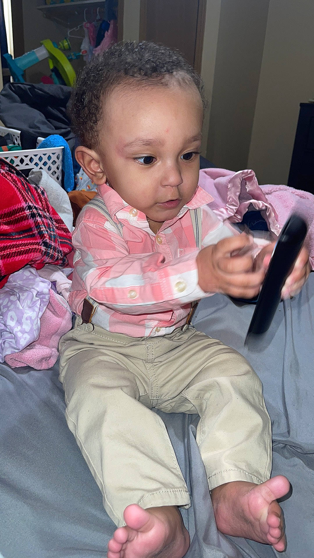 Norman joined the competition — help win amazing prizes! baby, baby_toddler_clothing, cheek, child, comfort, cool, finger, foot, fun, hairstyle, hand, lap, mammal, mobile_phone, mouth, person, pink, sitting, skin, thumb