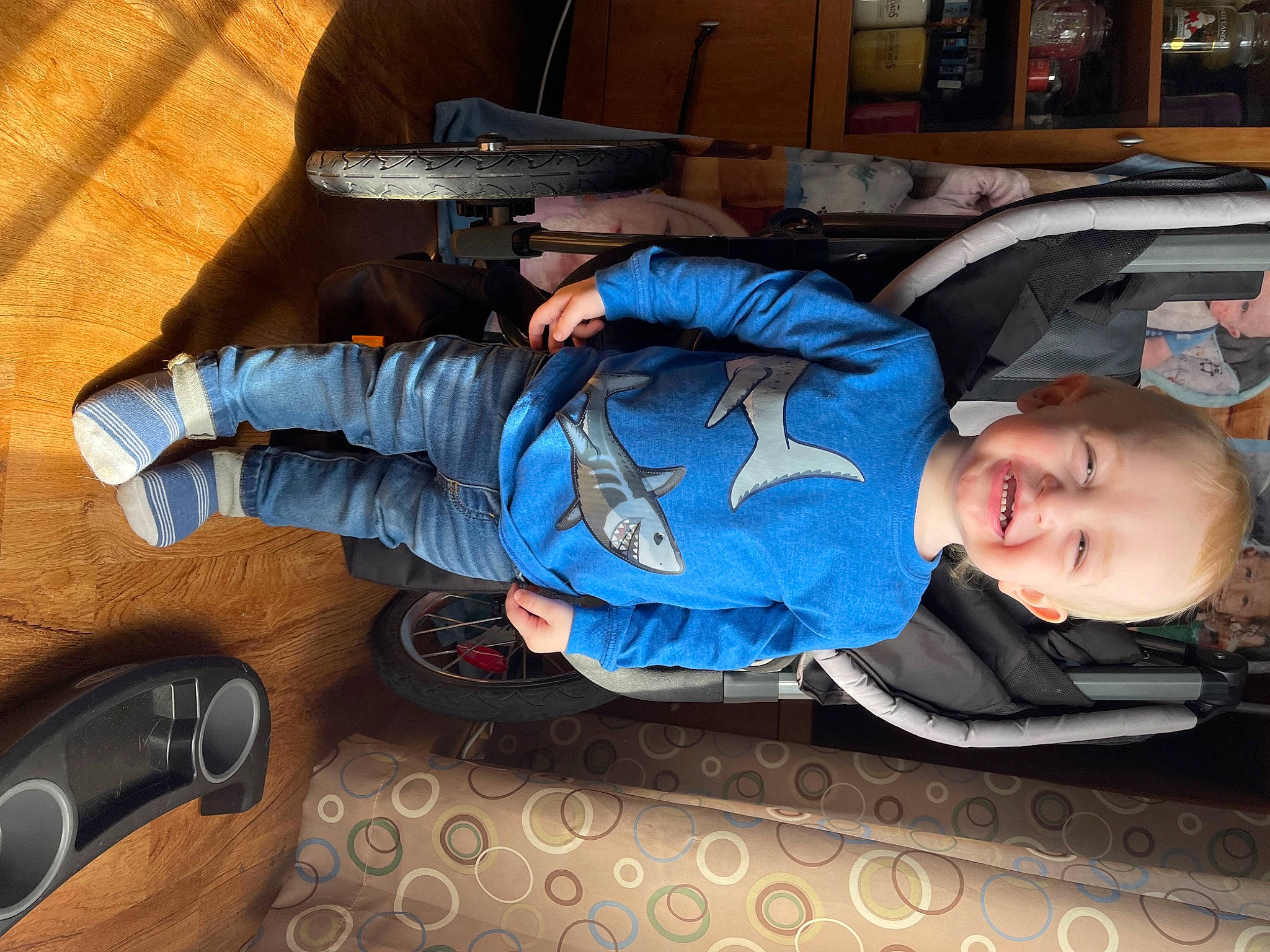 Maverick joined the competition — help win amazing prizes! auto_part, automotive_exterior, baby_toddler_clothing, bag, baggage, child, comfort, denim, electric_blue, flooring, fun, hardwood, joy, lap, luggage_and_bags, luxury_vehicle, person, shoe, sitting, sneakers