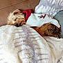 Love a rejoint le concours — aidez-le/la à gagner de superbes lots ! dog, sleeping, blanket, couch, cozy, fur, pet, indoor, resting, cute, small_dog, brown_fur, white_blanket, knit_sweater, comfort, relaxation, home, nap, warm, furry