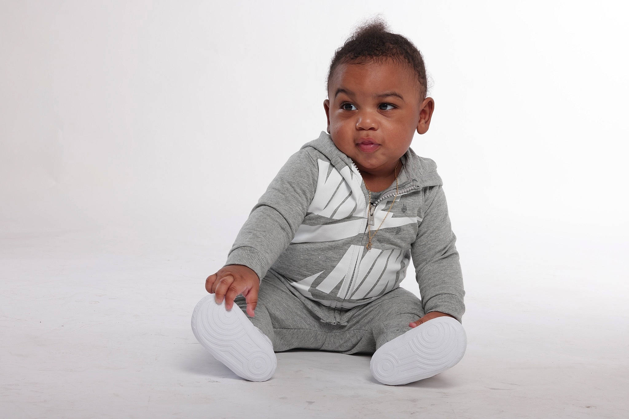Jacory joined the competition — help win amazing prizes! baby, baby_toddler_clothing, cheek, comfort, elbow, flash_photography, floor, flooring, fun, gesture, grey, happy, knee, person, portrait_photography, sitting, sleeve, smile, t_shirt, toddler