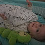 Spencer joined the competition — help win amazing prizes! baby, blanket, blue, caterpillar, child, comfort, cozy, cute, face, green, head, indoors, infant, lying_down, paciifier, patterned_cloth, sleeping_area, soft_toy, stuffed_toy, swaddle