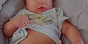 Kairann is registered to the contest to win money with this photo: baby, infant, diaper, clothing, blanket, lying_down, cute, face, expression, skin, hand, foot, soft, comfort, indoors, child, person, young, toddler, casual