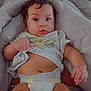 baby, infant, diaper, clothing, blanket, lying_down, cute, face, expression, skin, hand, foot, soft, comfort, indoors, child, person, young, toddler, casual