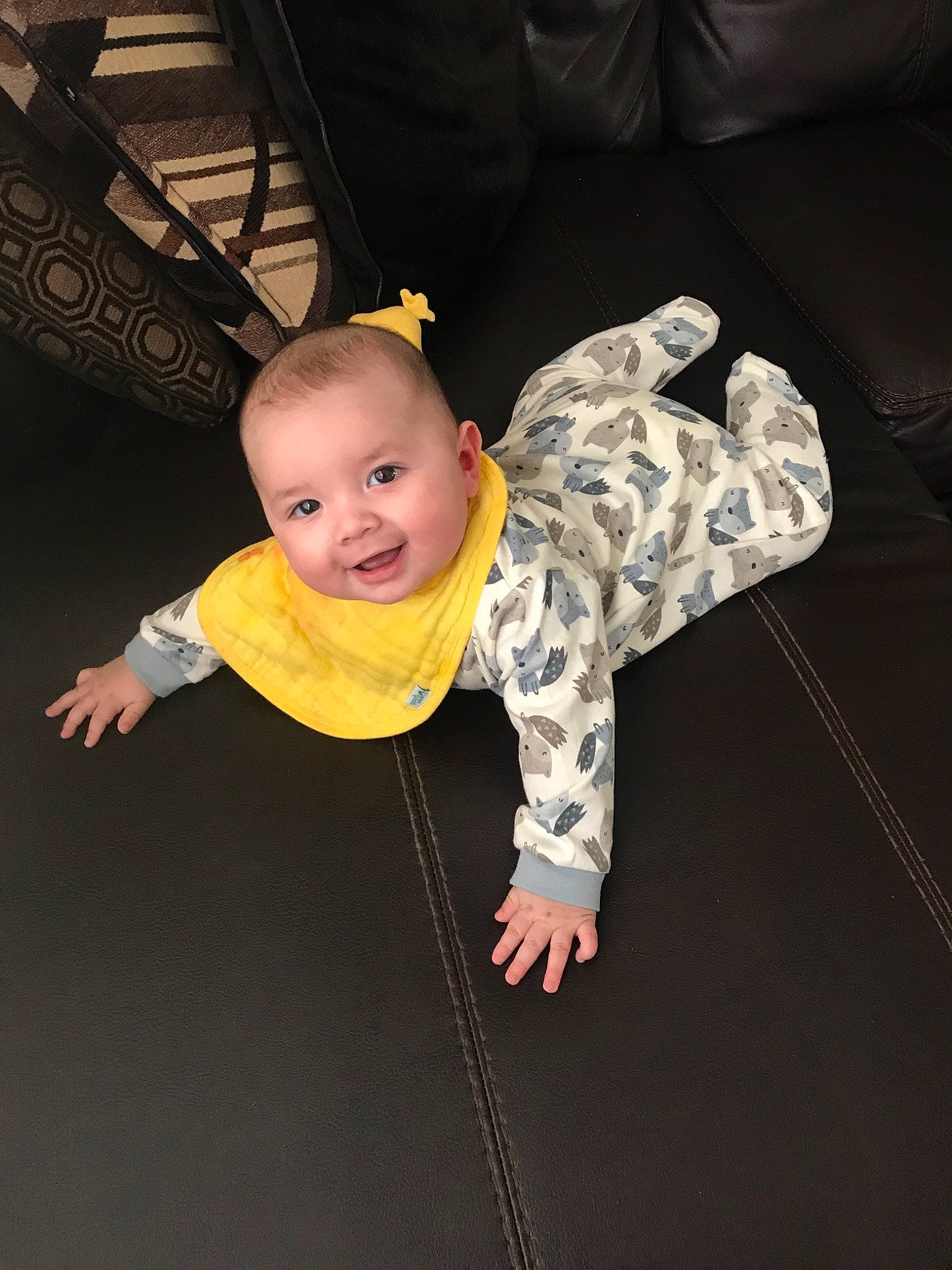 Aleksander is registered to the contest to win money with this photo: baby, child, crawling, fun, person, smile, toddler, yellow