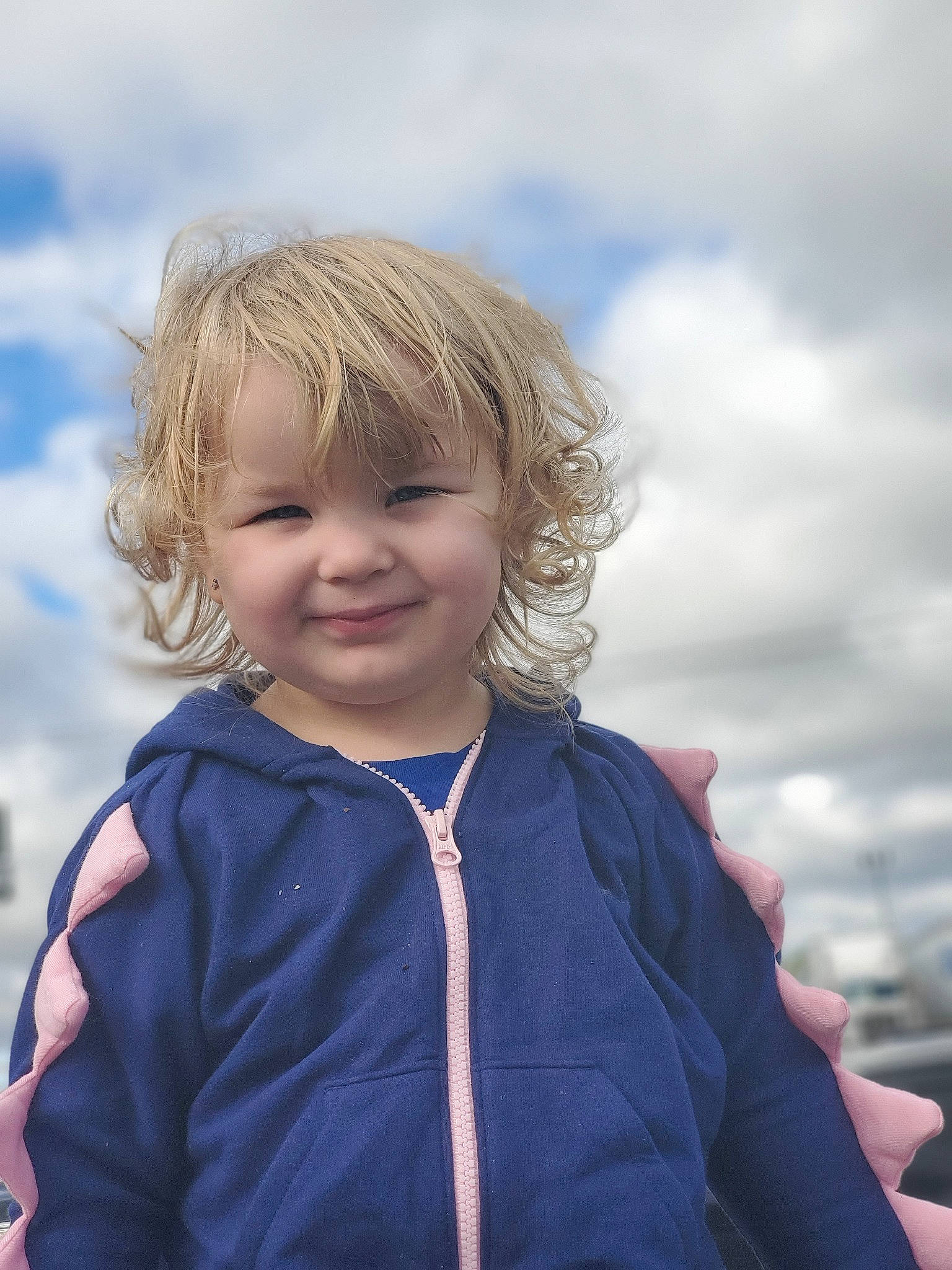 Rori is registered to the contest to win money with this photo: blond, blue, child, cloud, eye, face, fun, hair, hairstyle, happy, head, joy, outerwear, people, person, photography, portrait_photography, skin, sky, smile