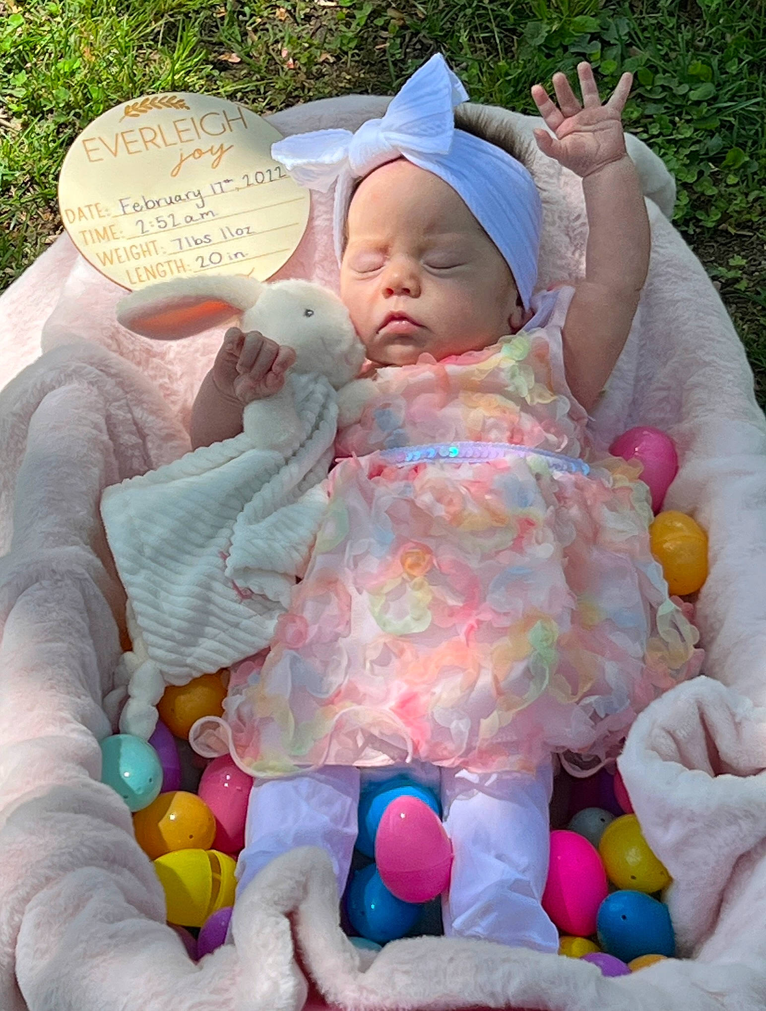 Everleigh is registered to the contest to win money with this photo: baby, baby_toddler_clothing, cheek, child, comfort, face, facial_expression, finger, fun, happy, headwear, organ, people_in_nature, person, photograph, pink, product, skin, summer, toddler