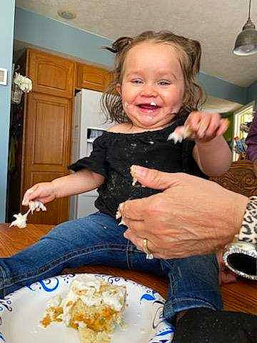 Ou'Rene is registered to the contest to win money with this photo: cabinetry, chair, comfort_food, cooking, cuisine, dish, door, food, food_craving, fun, happy, ingredient, jeans, joy, lap, person, plate, sharing, sitting, smile