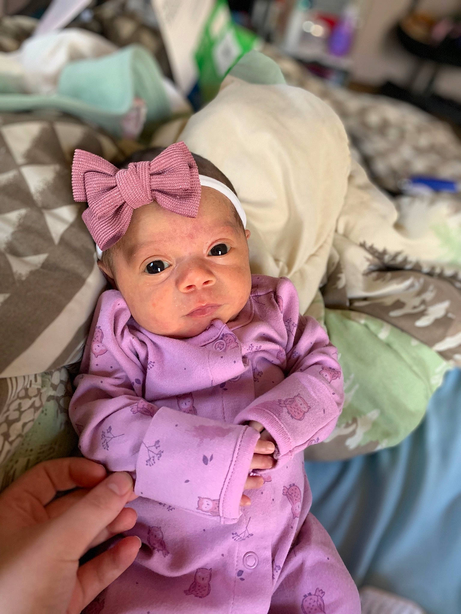 Raziyah joined the competition — help win amazing prizes! baby, baby_toddler_clothing, cheek, child, comfort, event, eye, fun, gesture, happy, head, headgear, headwear, linens, magenta, person, pink, purple, sitting, sleeve