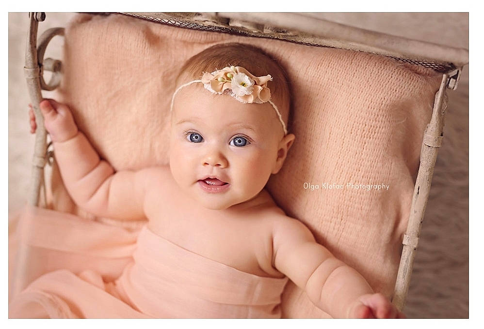Kinsey joined the competition — help win amazing prizes! baby, beige, cheek, child, ear, eye, face, hair_accessory, head, headgear, headpiece, person, photograph, photography, picture_frame, pink, product, skin, stock_photography, textile