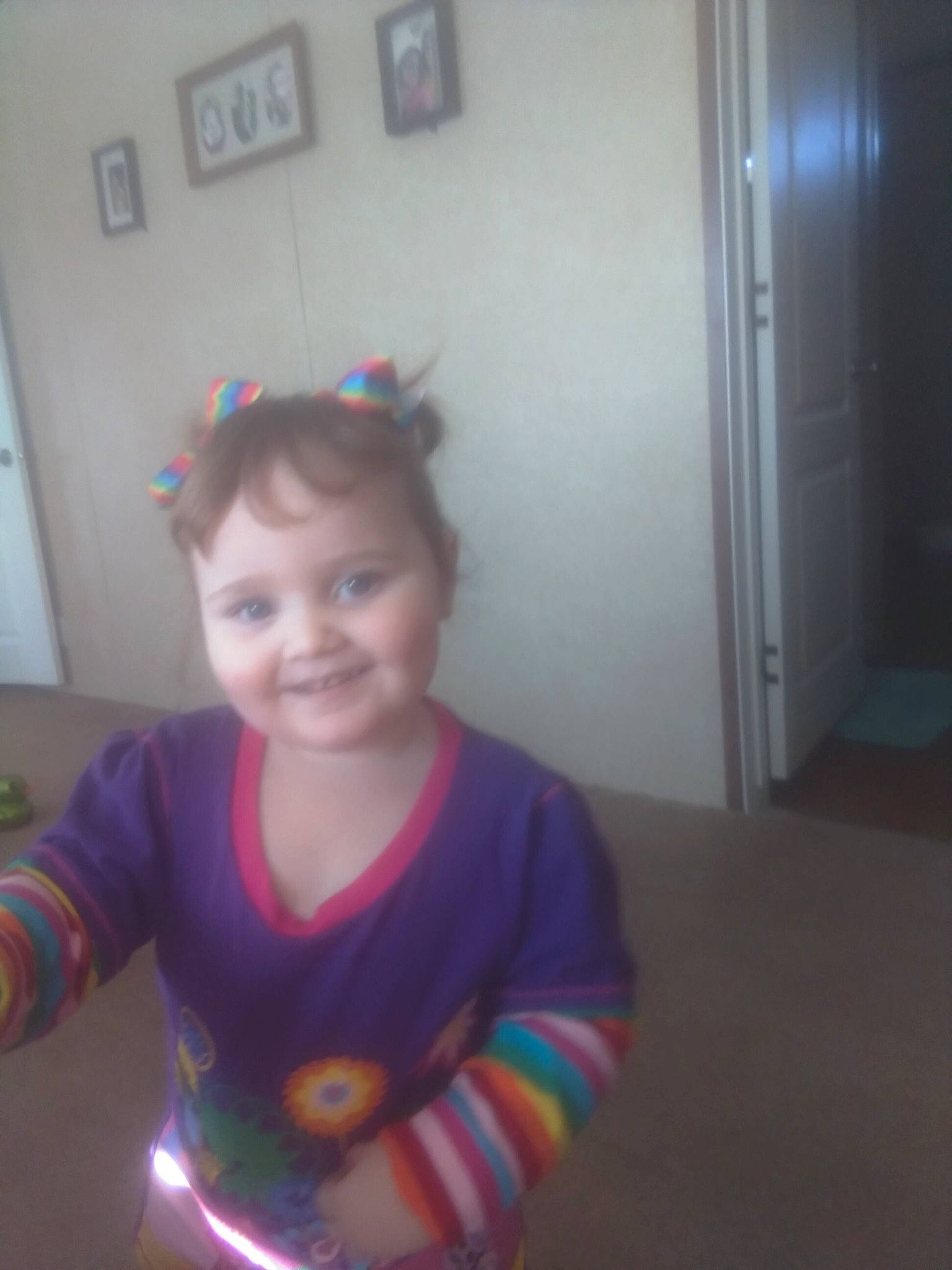 Mckenna is registered to the contest to win money with this photo: baby_toddler_clothing, cheek, chin, cool, eye, flooring, fun, hairstyle, happy, head, iris, joy, mouth, nose, person, picture_frame, shoulder, skin, sleeve, smile