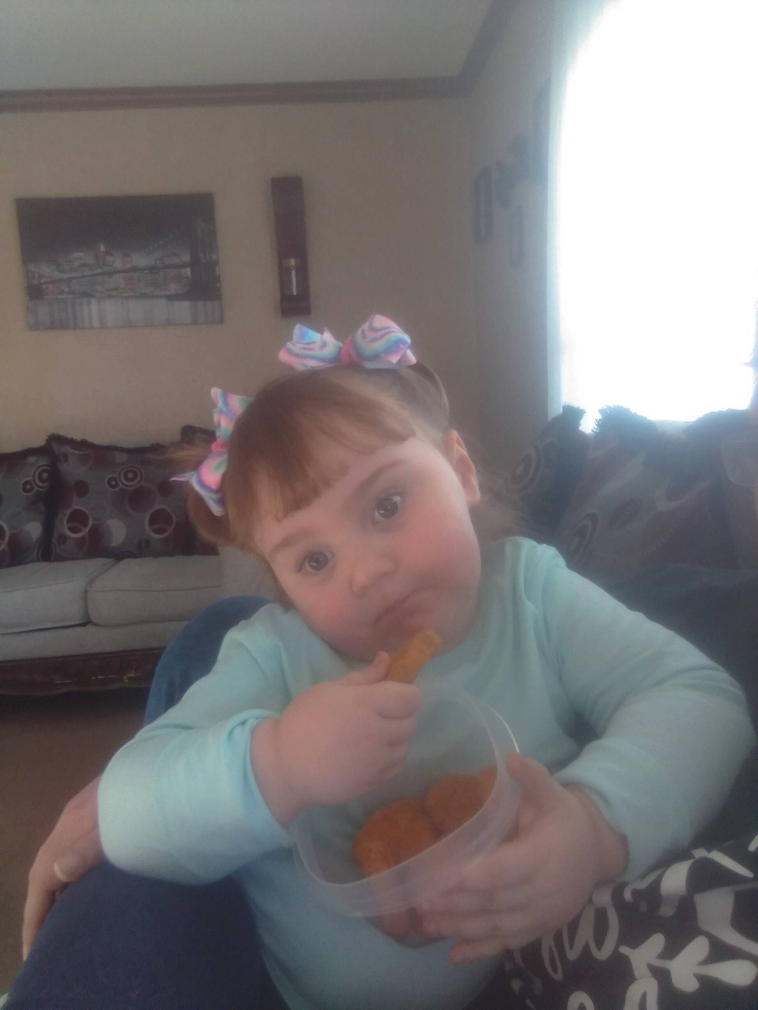 Mckenna joined the competition — help win amazing prizes! arm, baby, baby_toddler_clothing, chair, cheek, child, comfort, couch, finger, fun, gesture, happy, lap, mouth, person, room, sitting, skin, t_shirt, thumb