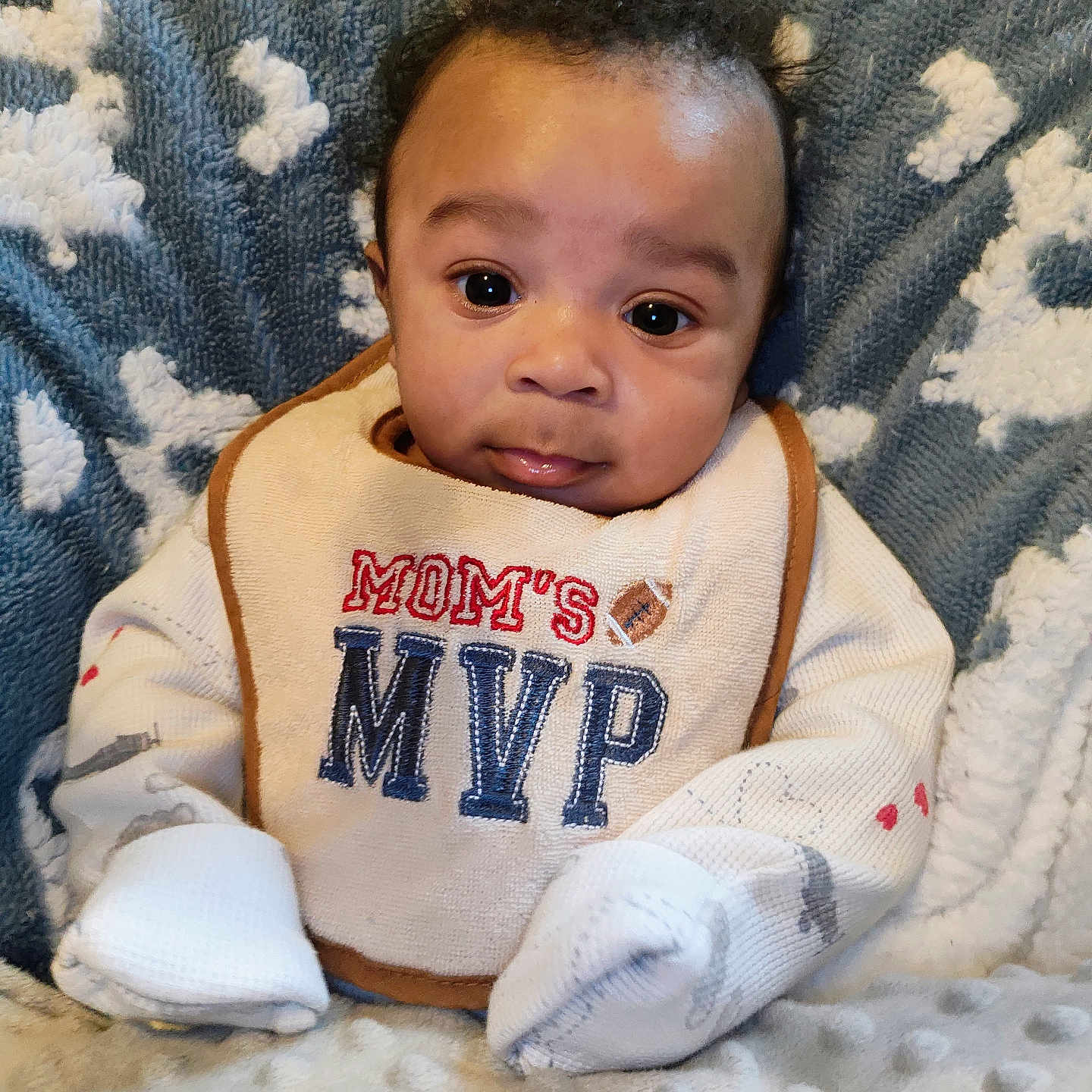 Te'Khai is registered to the contest to win money with this photo: baby, bed, bib, blanket, clothing, couch, cushion, face, furniture, head, homedecor, knitwear, newborn, person, photography, portrait, quilt, sitting, sweater, sweatshirt