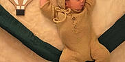 Thiago is registered to the contest to win money with this photo: baby, bear_ears, blanket, cardboard, child, cozy, creative, cute, fabric, hot_air_balloon, imaginative, indoors, infant, knitwear, peaceful, playful, portrait, resting, sleeping, soft_texture