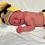 Autumn joined the competition — help win amazing prizes! newborn, baby, sleeping, crocheted_hat, yellow, blanket, infant, cute, soft, resting, smile, skin, hand, lying_down, cozy, indoors, portrait, child, peaceful, warm