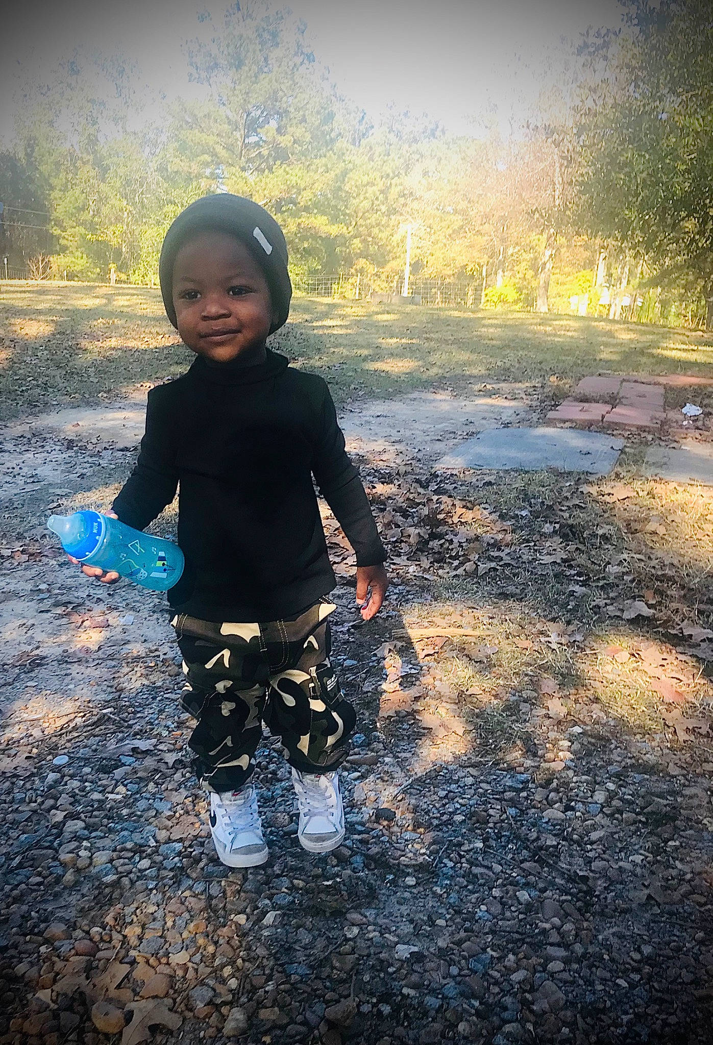 Zavian is registered to the contest to win money with this photo: asphalt, backlighting, cloud, cool, electric_blue, flash_photography, fun, grass, happy, horizon, landscape, people_in_nature, person, reflection, sky, sunlight, sunset, tints_and_shades, toddler, water