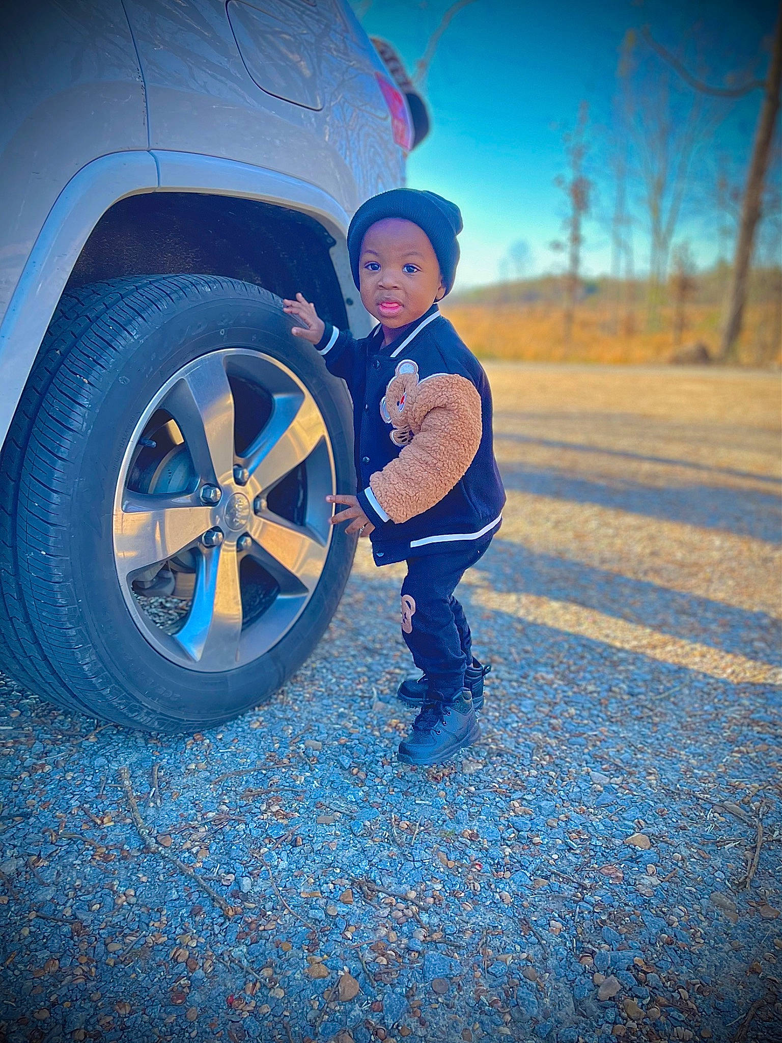 Zavian joined the competition — help win amazing prizes! alloy_wheel, asphalt, automotive_design, automotive_exterior, automotive_lighting, automotive_tire, azure, blue, car, hat, hood, hubcap, motor_vehicle, person, sky, synthetic_rubber, tire, tread, vehicle, vehicle_door