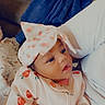 Demyah joined the competition — help win amazing prizes! baby, blue_blanket, bow, child, clothing, couch, cozy, cute, fabric, gaze, headband, indoor, infant, onesie, pattern, person, pink, portrait, soft, strawberry