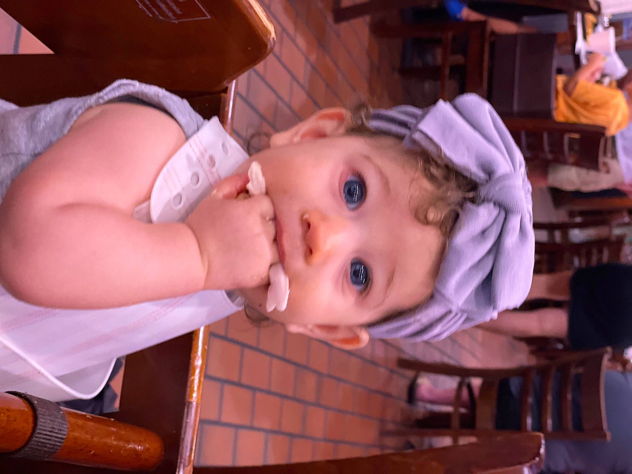 Azusa is registered to the contest to win money with this photo: baby, baby_products, baby_toddler_clothing, cap, chair, cheek, child, eyelash, fashion_accessory, fun, happy, hat, lip, mouth, nose, person, sitting, skin, smile, toddler