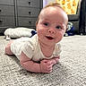 baby, smiling, carpet, indoor, furniture, dresser, chair, child, happy, crawling, person, home, floor, cute, infant, plush, clothing, head, face, living_room