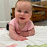 Lilith joined the competition — help win amazing prizes! baby, child, smiling, face, pink_shirt, indoor, blanket, crawling, happy, infant, cute, person, portrait, furniture, home, floor, skin, head, expression, young