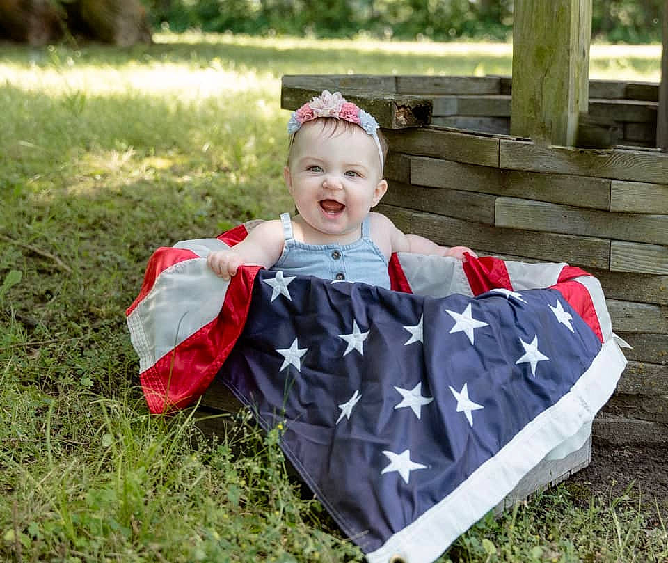 Micha joined the competition — help win amazing prizes! baby, baby_toddler_clothing, child, costume, dress, event, fun, grass, happy, joy, lawn, leaf, leisure, pattern, person, plant, sitting, sleeve, smile, t_shirt