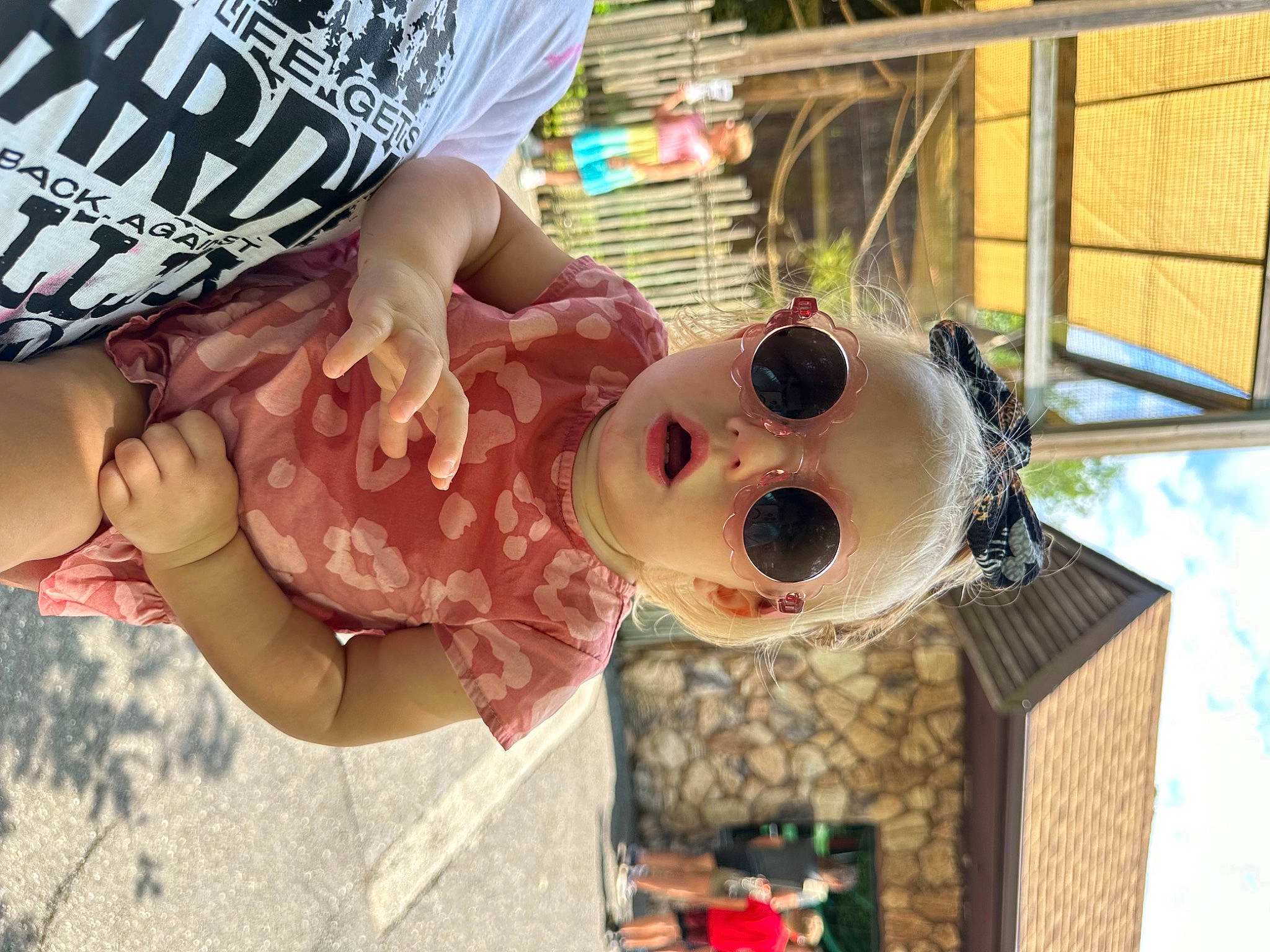 Amerah joined the competition — help win amazing prizes! baby, baby_toddler_clothing, child, eyewear, fun, fur, gesture, happy, pattern, person, room, sleeve, smile, stuffed_toy, sunglasses, toddler, toy, window, wrist
