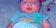 Logan is registered to the contest to win money with this photo: baby, pacifier, blanket, blue, sleeping, infant, soft, plush, pillow, cute, mohawk, clothing, resting, indoors, child, newborn, face, hand, comfort, peaceful