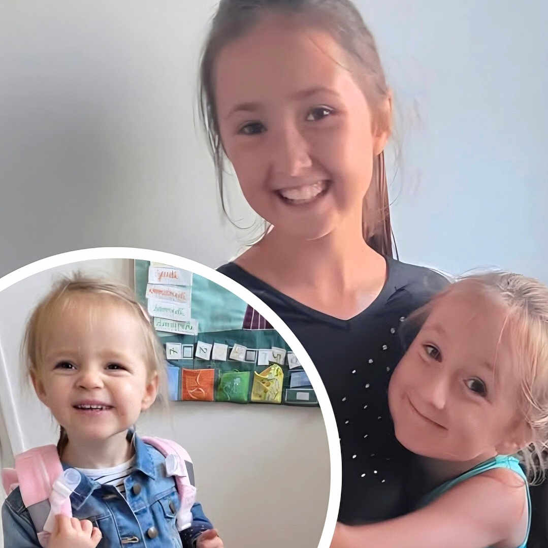 Lea participe au concours pour gagner de l'argent avec cette photo : backpack, black_shirt, blue_tank_top, casual_clothing, child, children, cute, denim_jacket, family, friendship, girl, happy, hug, indoor, joy, light, playful, portrait, smile, young