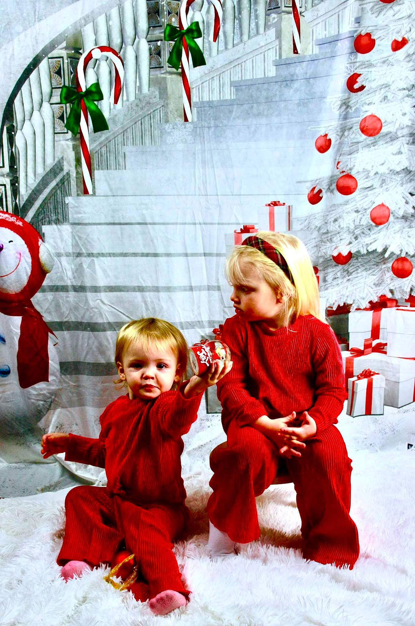 Adeline is registered to the contest to win money with this photo: child, christmas, christmas_decoration, christmas_eve, christmas_ornament, event, fictional_character, freezing, fun, happy, holiday, ornament, people_in_nature, person, red, santa_claus, snow, toddler, tree, window