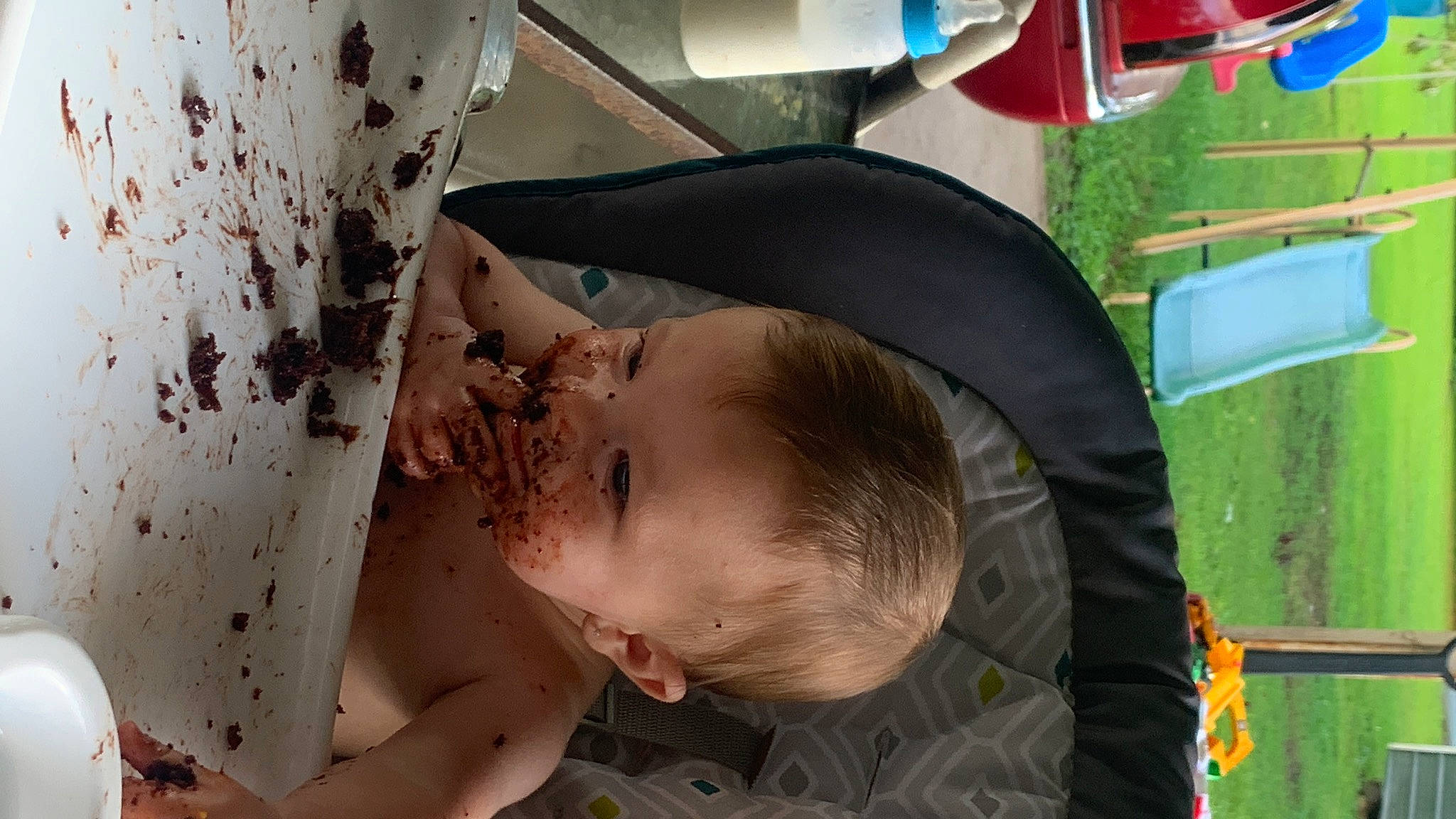 Xander is registered to the contest to win money with this photo: auto_part, automotive_exterior, automotive_tire, automotive_wheel_system, baby, bumper, chest, child, fender, flesh, fun, grass, leaf, leisure, motor_vehicle, pattern, person, tire, toddler, vehicle_door