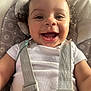 Macai joined the competition — help win amazing prizes! baby, child, smiling, curly_hair, white_shirt, seat_belt, baby_seat, patterned_cushion, happy, indoors, closeup, face, infant, portrait, cute, young_child, safety_straps, comfortable, natural_light, playful