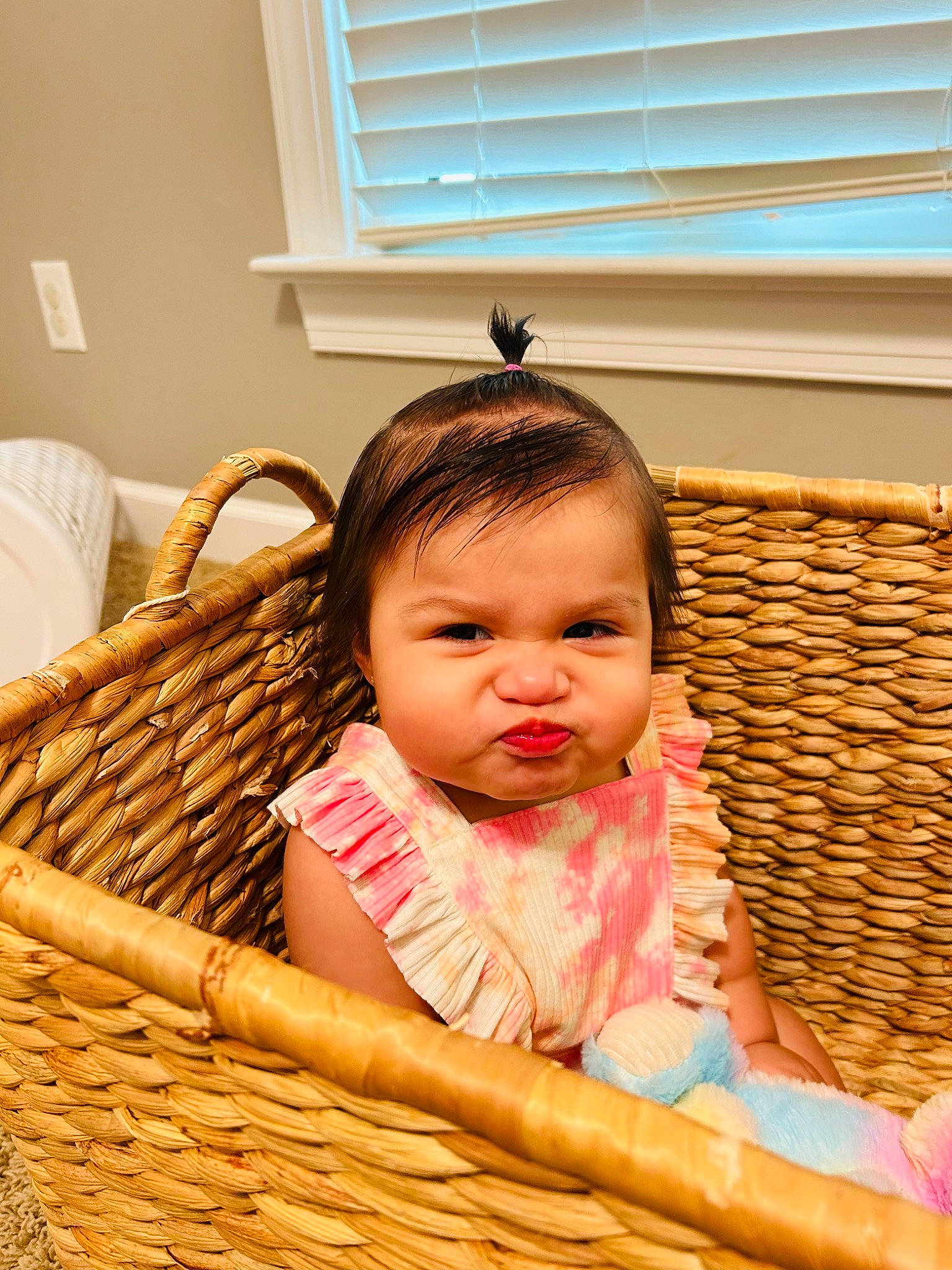 Elena is registered to the contest to win money with this photo: baby, baby_products, baby_toddler_clothing, basket, cheek, child, comfort, happy, home_accessories, person, product, room, sitting, skin, storage_basket, toddler, wicker, window, window_blind, window_covering
