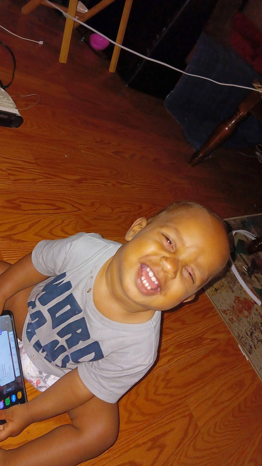 Ky'Ree is registered to the contest to win money with this photo: chair, cheek, chest, elbow, flooring, fun, happy, human_body, human_leg, joint, joy, knee, leg, mouth, muscle, person, smile, t_shirt, thigh, thumb