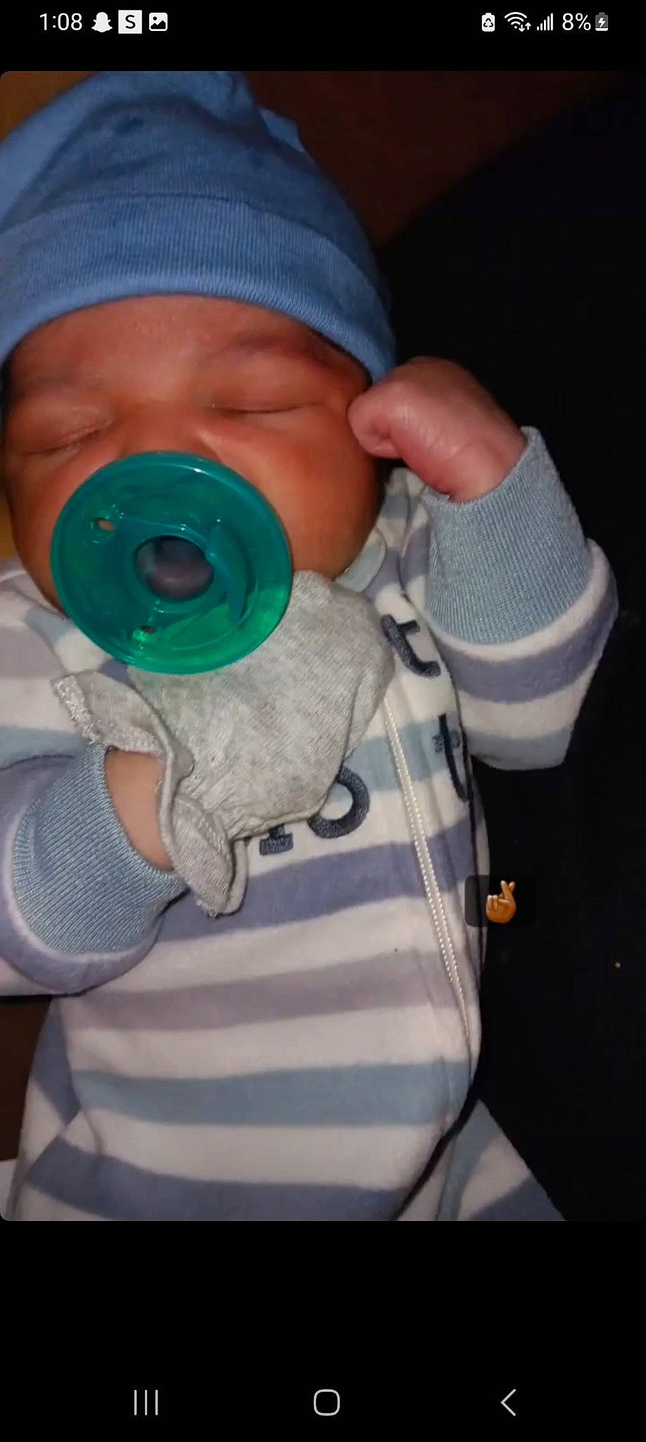 Karter is registered to the contest to win money with this photo: baby, baby_toddler_clothing, cap, cheek, drinkware, eyelash, face, finger, hand, hat, headwear, health_care, mouth, nail, neck, outerwear, person, personal_protective_equipment, plastic_bottle, sleeve