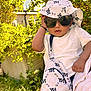 Arsalan joined the competition — help win amazing prizes! baby, bag, child, cute, fashion, garden, grass, greenery, hand, hat, house, ny_print, outdoor, person, portrait, summer, sunglasses, sunlight, toddler, white_clothing