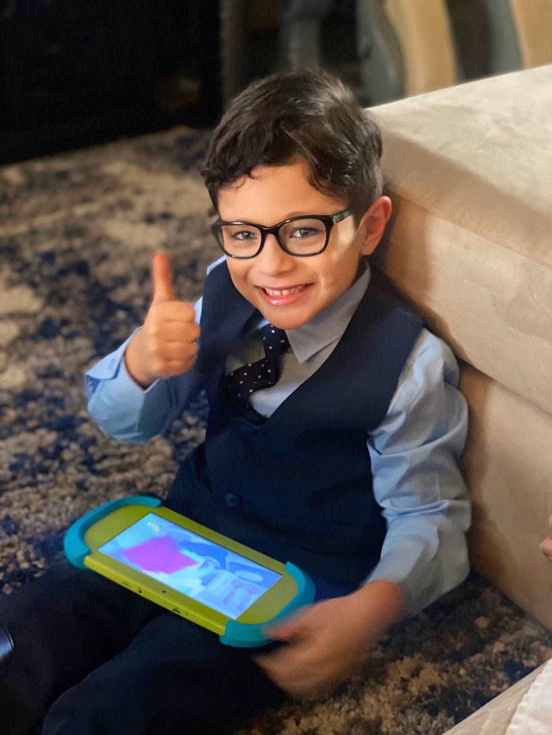 Micah joined the competition — help win amazing prizes! child, communication_device, electronic_device, event, eyewear, flash_photography, fun, gadget, happy, job, joy, mobile_device, mobile_phone, people, person, portable_communications_device, recreation, sitting, smile, t_shirt