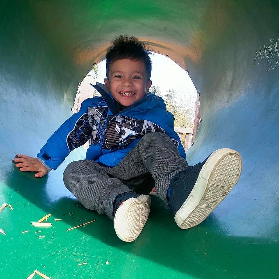 Micah joined the competition — help win amazing prizes! azure, child, cool, electric_blue, flash_photography, fun, grass, happy, joy, leg, leisure, natural_environment, people_in_nature, person, recreation, sitting, sleeve, smile, sneakers, toddler