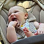 baby, chewing, child, closeup, comfort, cushion, fabric, foot, hand, happy, head, infant, outdoor, pacifier, person, playful, seatbelt, smiling, stroller, sunlight