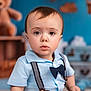 toddler, child, boy, blue_shirt, bow_tie, suspenders, indoor, portrait, cute, face, eyes, sitting, toy, stuffed_animal, background, home, clothing, baby, expression, person