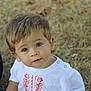 toddler, child, boy, face, blue_eyes, hair, white_shirt, embroidered_shirt, outdoor, grass, nature, portrait, cute, innocent, young_child, casual_clothing, closeup, head_and_shoulders, looking_up, daylight