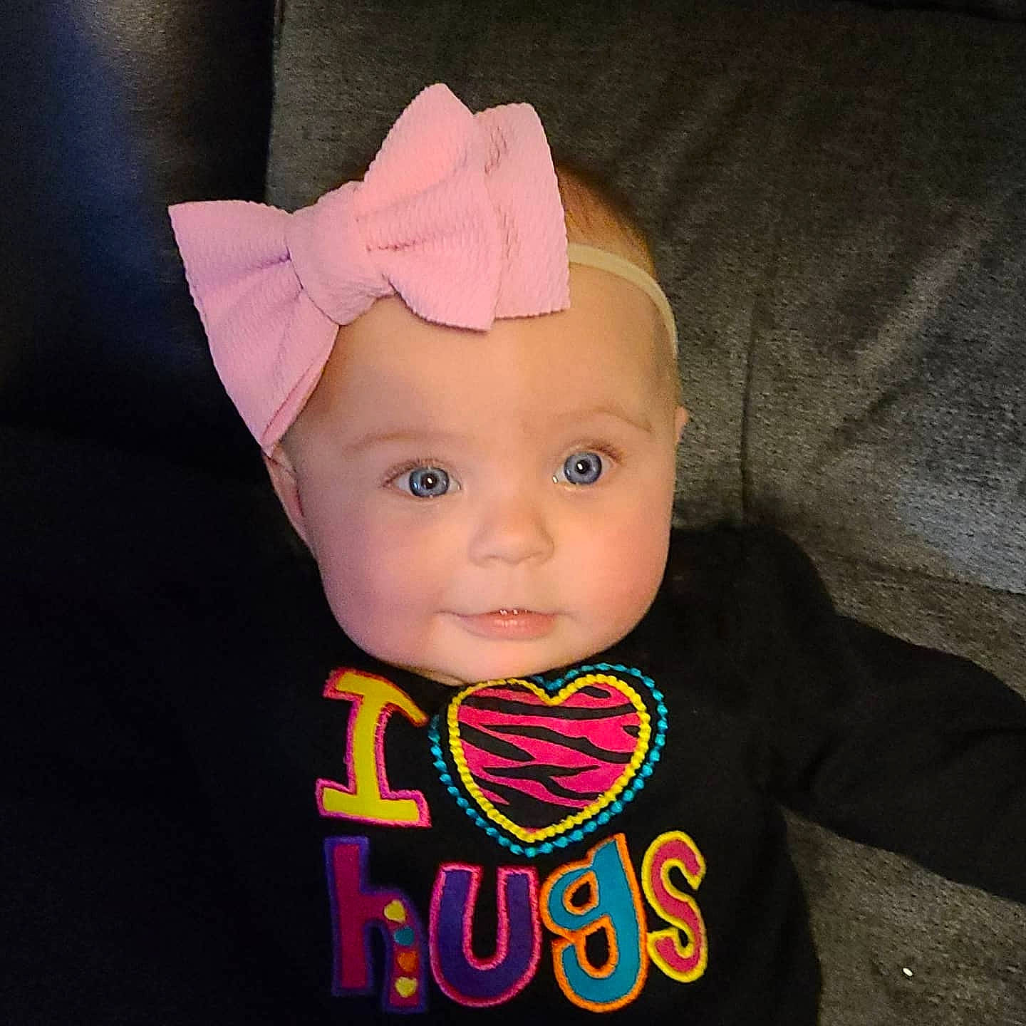 Josie joined the competition — help win amazing prizes! baby, baby_products, baby_toddler_clothing, bow_tie, cheek, child, clothing, cool, costume_accessory, ear, face, fashion_accessory, hair_accessory, head, headgear, headwear, lip, organ, person, pink