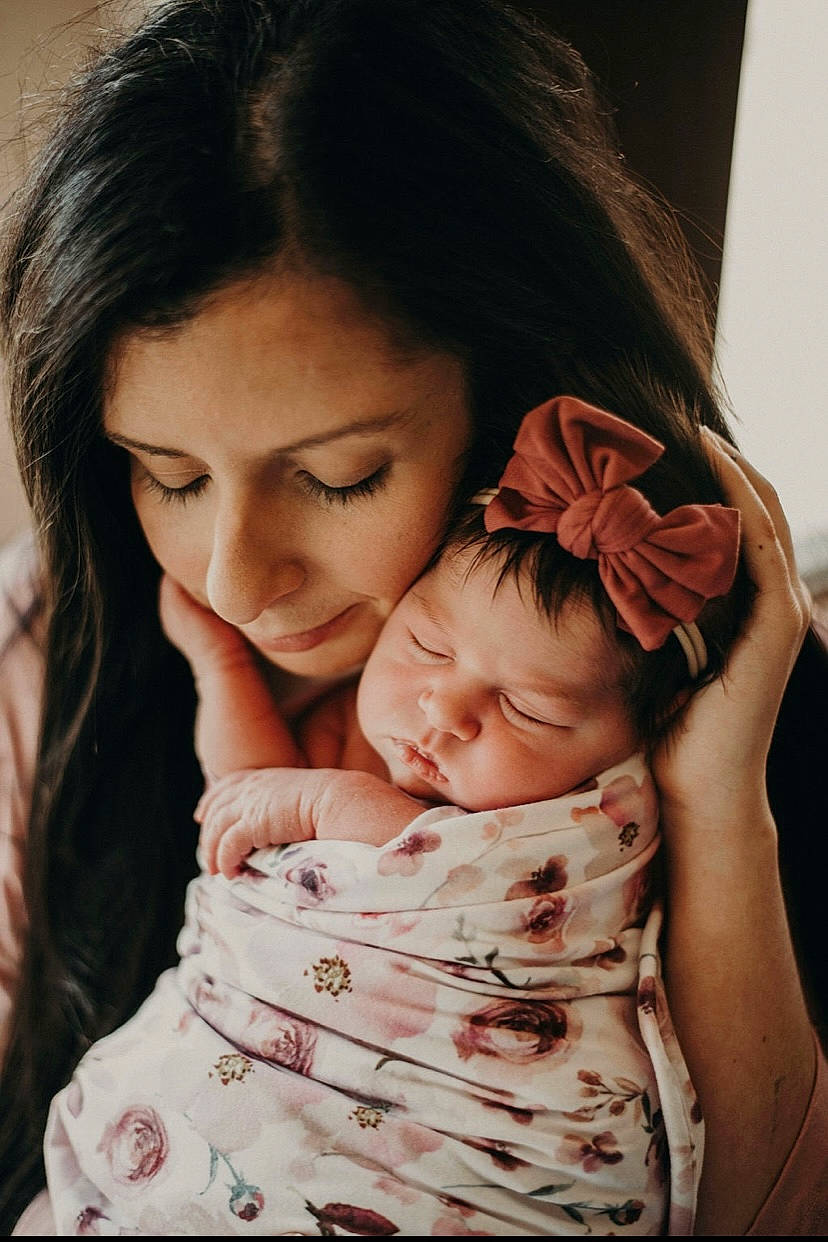 Willow Mae is registered to the contest to win money with this photo: baby, black_hair, cheek, comfort, elbow, face, facial_expression, flash_photography, gesture, hand, happy, interaction, lip, neck, nose, people, people_in_nature, person, skin, smile